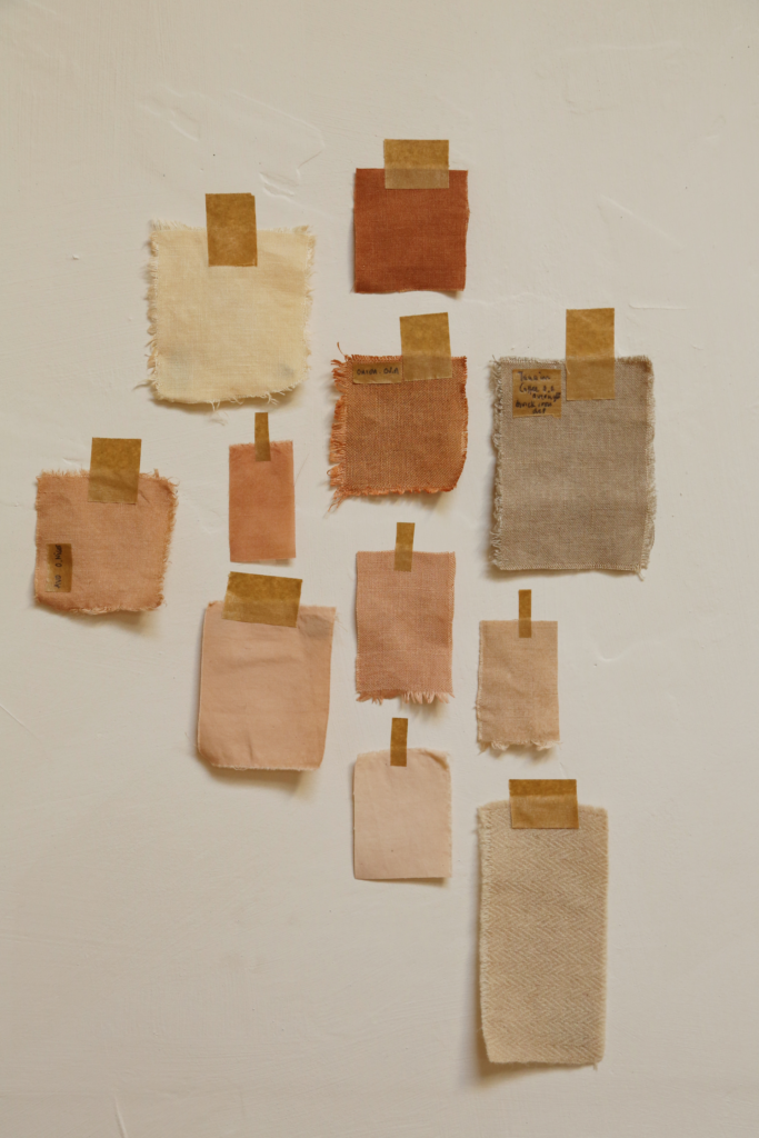 swatches of linen naturally dyed with avocado stones